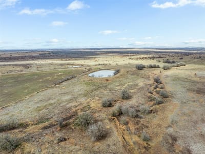 Aerial view with expansive Hill Country acreage at 000 Political Rd - N/A, Lockhart, TX