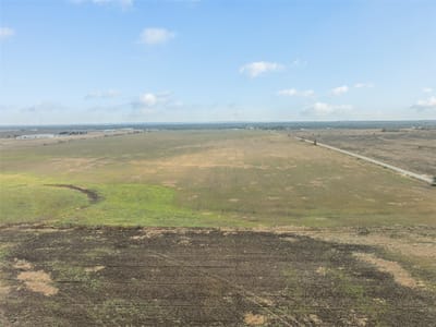 Aerial view with expansive land parcel at 000 Political Rd - N/A, Lockhart, TX
