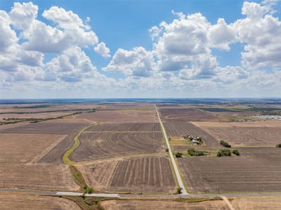 Aerial view with large agricultural tract at 000 Wells Ln - N/A, Manor, TX