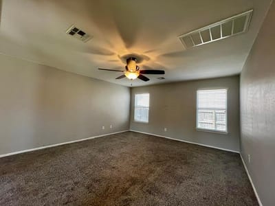 Primary bedroom at 100 Magpie Goose LN - 4 bed 3 bath home