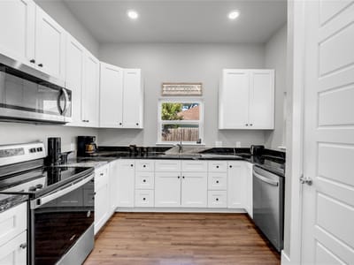 Primary bedroom at 100 S Thomas Cv - 4 bed 2 bath home