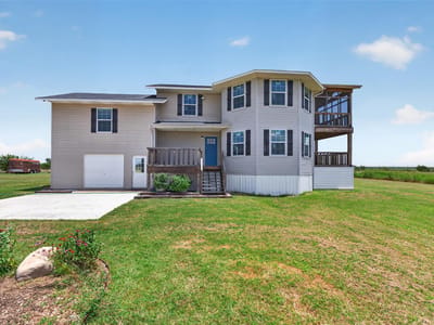 Living area at 10000 County Road 210 - 4 bed 2 bath home