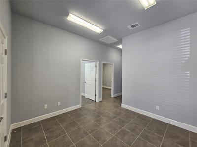 Living area at 1009 W Pecan St Unit #103 - Library Office Park Condominiums, Pflugerville, TX