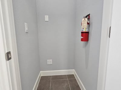 Primary bedroom at 1009 W Pecan St Unit #103 - Library Office Park Condominiums, Pflugerville, TX