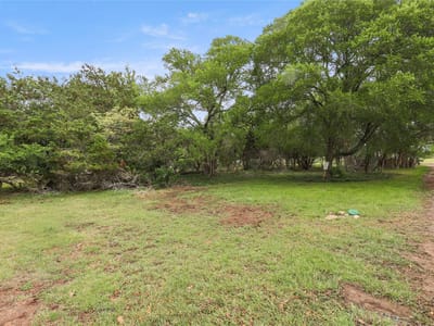 Property photo 2 at 101 Brookhollow Dr - Woodcreek Sec 6-C, Wimberley, TX