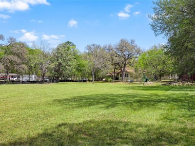 Primary bedroom at 10230 Menchaca Rd - ABS 27 SUR 2 WILSON W ACR 1.32, Austin, TX
