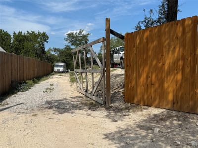 Primary bedroom at 10300 Little Creek Cir - MOUNTAIN CREEK LAKES SEC 1, Dripping Springs, TX