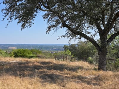 Backyard - 1033 Flying X Rd Backyard with expansive Hill Country views at 1033 Flying X Rd - Spicewood, TX