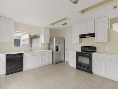 Primary bedroom at 10341 Garbacz DR - 4 bed 2 bath home