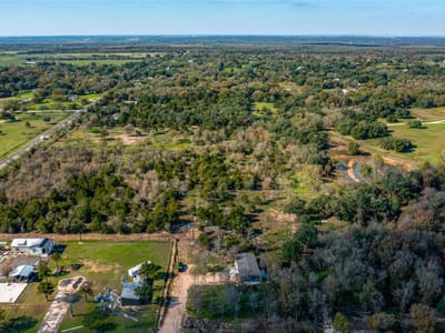 Primary bedroom at 105 Crooked Rd - Lytton Hollow, Dale, TX
