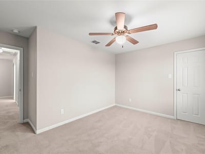 Primary bedroom at 105 J E Brown Ln - 5 bed 2 bath home