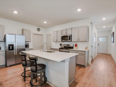 Living area at 105 Merrick RD - 4 bed 2 bath home