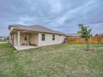 Living area at 10601 Seguin ST - 4 bed 3 bath home