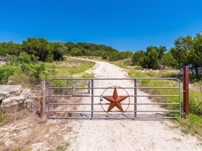 Primary bedroom at 10614 Deer Canyon RD - Panoramic Hills, Jonestown, TX