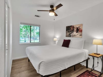 Primary bedroom at 107-109 Scudder Ln - Cypress Creek North, Wimberley, TX