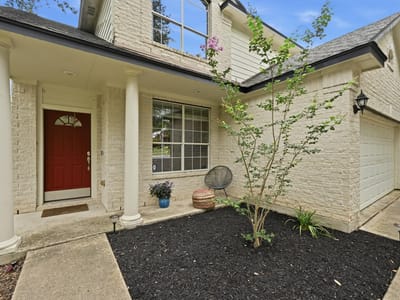 Primary bedroom at 10701 Beard Ave - 3 bed 2 bath home