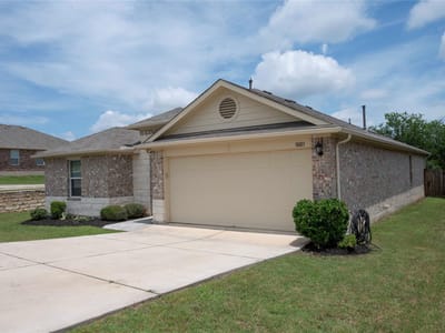 Primary bedroom at 10813 Mule Train DR - 4 bed 2 bath home