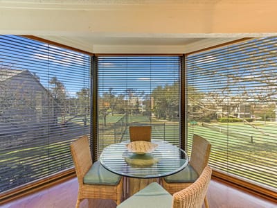 Primary bedroom at 110 World Of Tennis Sq Unit #D-110 - 4 bed 4 bath home