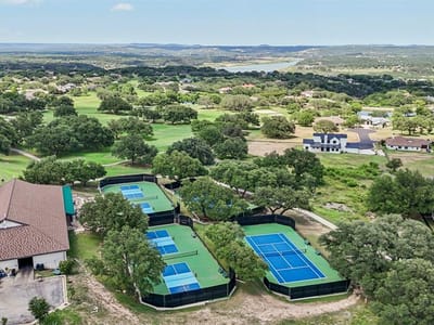 Primary bedroom at 1100 Majestic Hills Blvd - Barton Creek Lakeside, Spicewood, TX