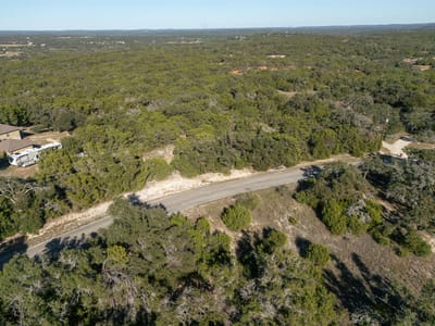 Primary bedroom at 1101 Madrone Rd - LEGENDS AT RANCHO DEL LAGO, Fischer, TX
