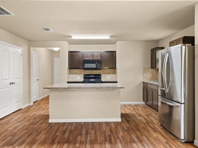 Living area at 1102 Mitchell DR - 4 bed 2 bath home