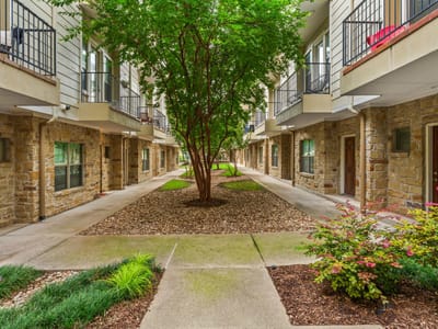 Primary bedroom at 1115 Kinney Ave Unit #9 - 2 bed 2 bath home
