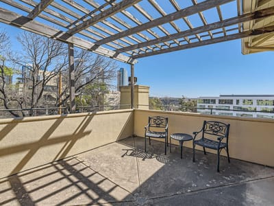 Living area at 1115 W 7th St W Unit #202 - 2 bed 2 bath home