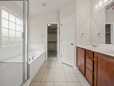 Primary bedroom at 11304 Staked Plains DR - 4 bed 2 bath home