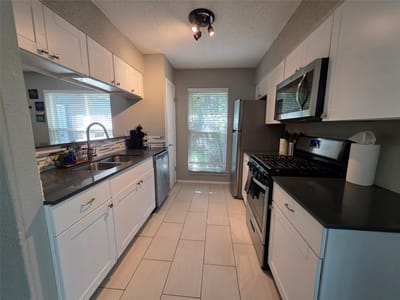 Primary bedroom at 11815 Lochridge DR Unit #B - 3 bed 2 bath home