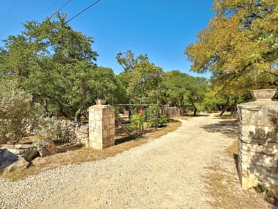 Primary bedroom at 120 Cedar Bend RD - Burnett Ranch Sec 2, Wimberley, TX