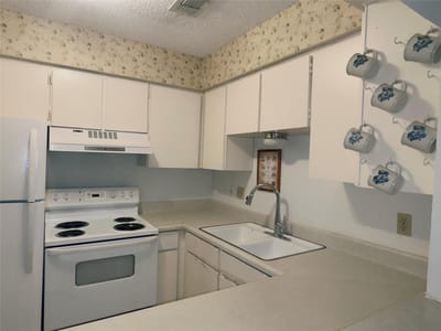 Kitchen at 1202 Hi Stirrup Unit #409 - 2 bed 2 bath home