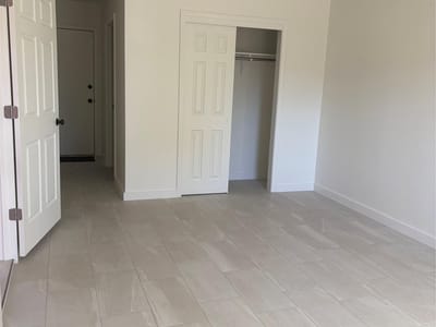 Primary bedroom at 1203 Hackberry DR - 7 bed 2 bath home