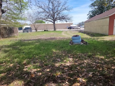 Primary bedroom at 1207 NE Loop 230 - Byrne, Smithville, TX