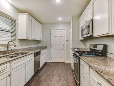 Primary bedroom at 12107 Scissortail DR - 4 bed 2 bath home