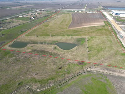 Aerial view with large acreage parcel at 1251 Fm 3349 - Taylor, TX