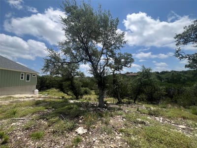 Primary bedroom at 1252 Parton RD - Point Rancho Del Lago 5, Canyon Lake, TX