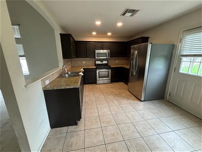 Kitchen at 12828 Starbrimson Trl - 3 bed 2 bath home