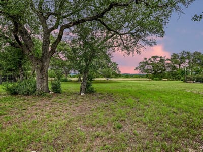 Primary bedroom at 13 Peace Pipe - WIMBERLEY SPRINGS SEC 1, Wimberley, TX