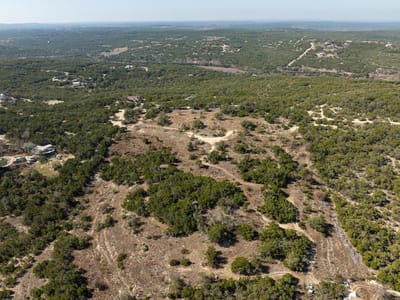 Primary bedroom at 1300 Norwood Loop - Hurlbut Ranch West, Dripping Springs, TX