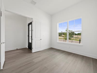 Primary bedroom at 1321 White Mistflower DR - 5 bed 4 bath home