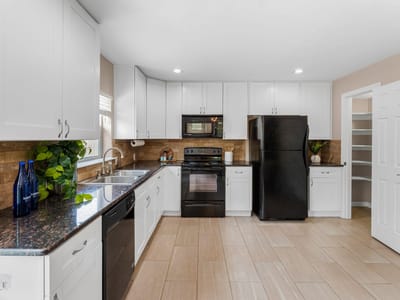 Property photo 2 at 13323 Villa Park Dr Unit B Unit #B - 3 bed 2 bath home