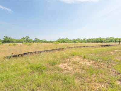 Primary bedroom at 1350 FERGUSON Loop - COOL WATER ACRES, Dale, TX