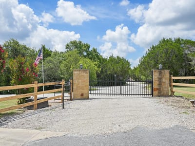 Primary bedroom at 13901 FM 1826 - 9 bed 6 bath home