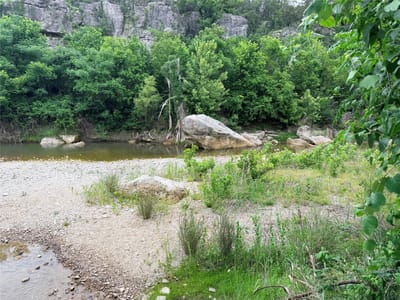 Primary bedroom at 1401 Valley View RD - Burnett Ranch Sec 3, Wimberley, TX
