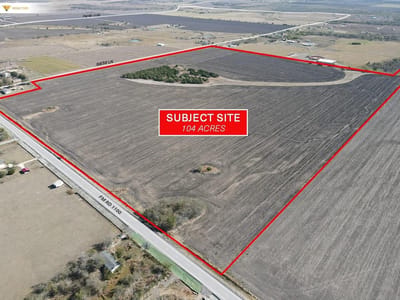 Aerial view with 104-acre agricultural/development land at 14315 FM 1100 Rd - Manor, TX