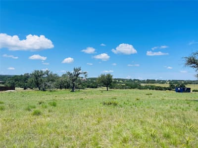 Primary bedroom at 150 Redemption Ave - Medlin Creek Ranch Ph III, Dripping Springs, TX