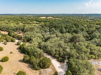 Primary bedroom at 15273 FM 150 Hwy W - Driftwood, TX