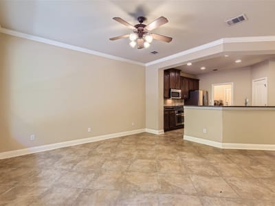 Living area at 15315 Origins Ln - 3 bed 2 bath home