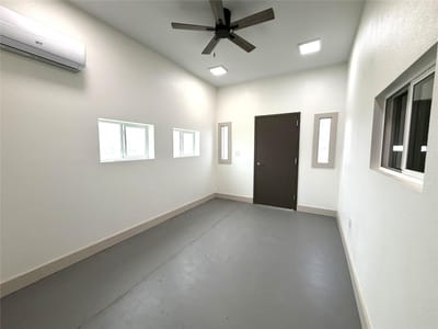 Primary bedroom at 1541 E Pierce St - Spencer Morris League, Luling, TX