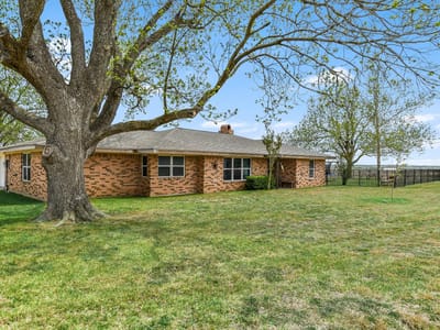 Primary bedroom at 1601 CR 463 (and CR 465) - T7053501-SCO-Coupland, Elgin, TX
